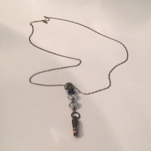 Black beaded lanyard.